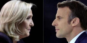 Macron e Le Pen, candidatos à presidência da França, vão às urnas